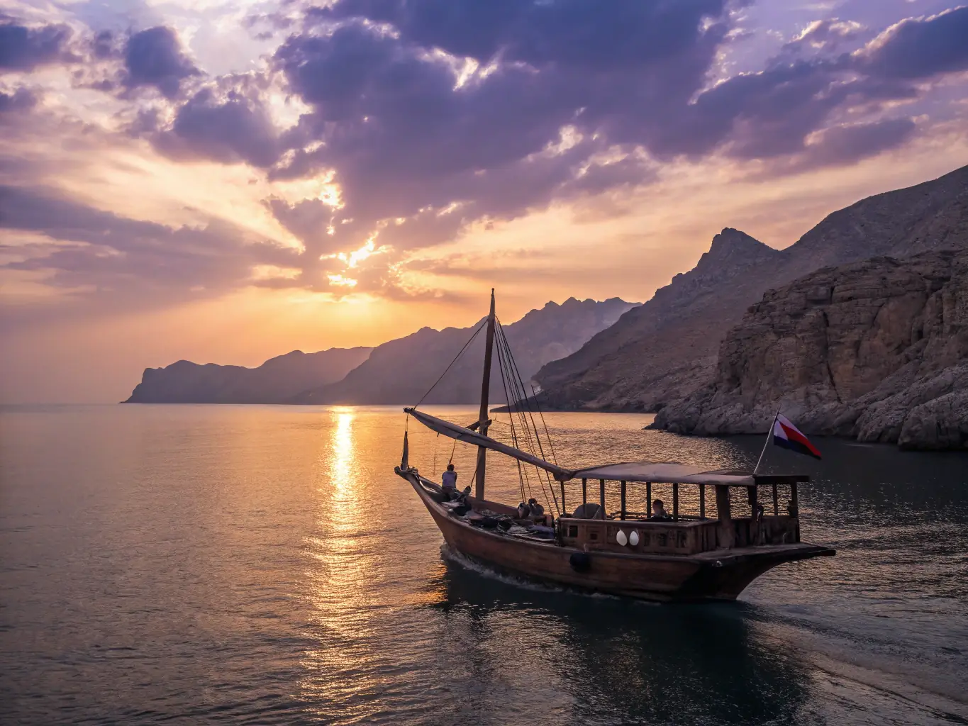 An adventurous image of a traditional dhow boat sailing on the ocean at sunset, with travelers enjoying the experience.